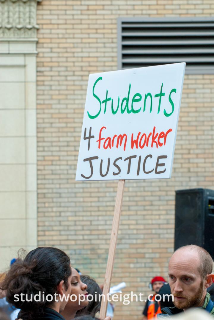 2015 Seattle May Day Immigrant Rally, Woman Held Students For Farm Worker Justice Sign