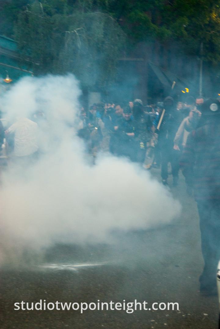 2015 Seattle May Day Protest Riot, The Protest Crowd Obscured by Large Cloud of Blast Ball Grenade Smoke and Tear Gas