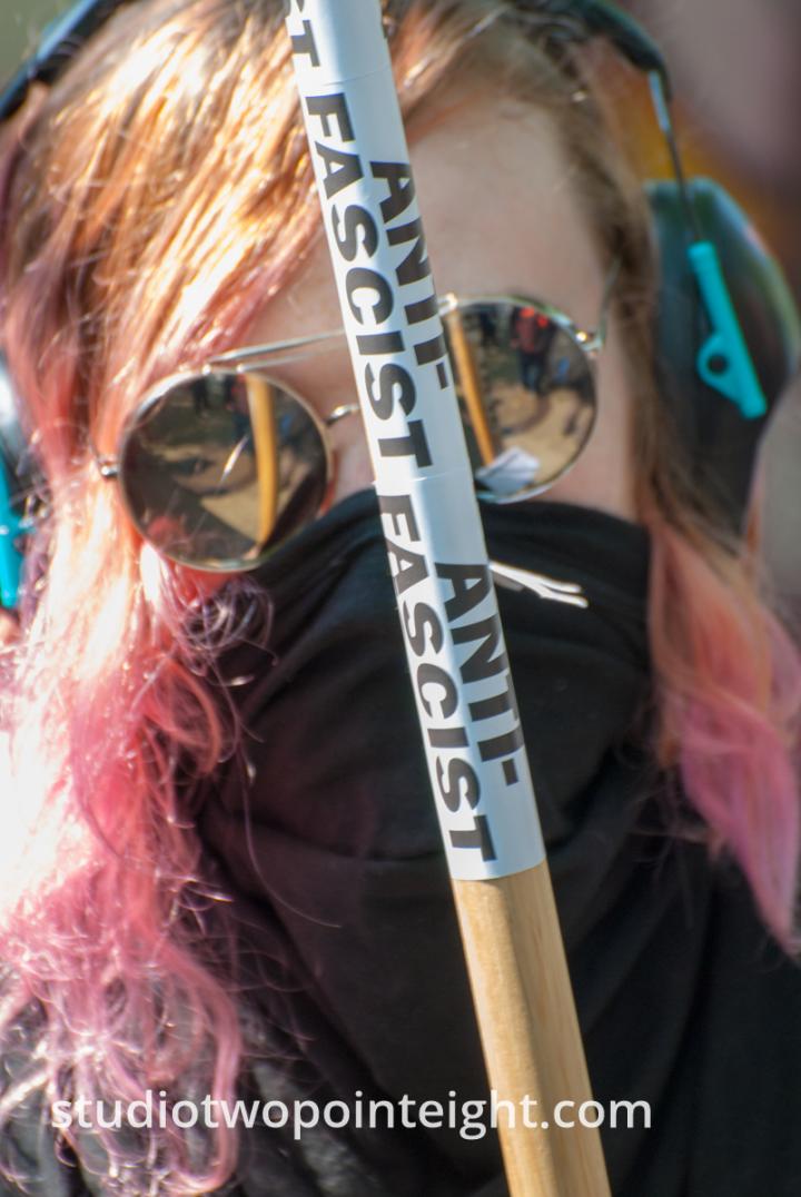Seattle, Liberty or Death Rally, August 18, 2018, Woman Holding Antifascist Stick