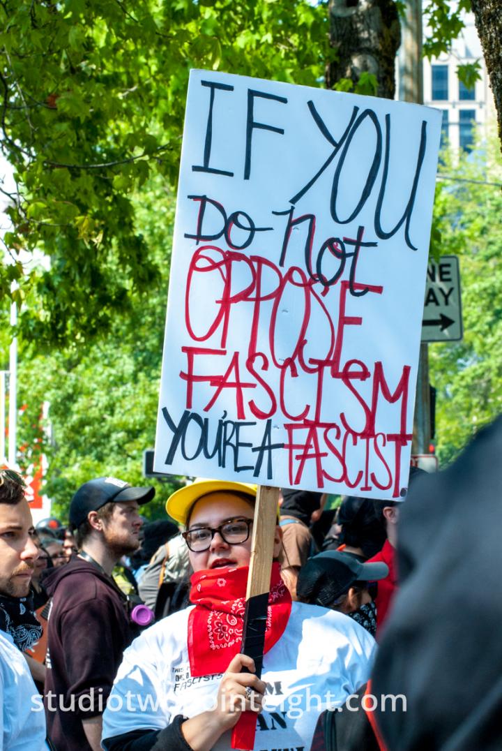 Studio 2.8, Liberty Or Death Rally, August 18, 2018, Female Communist Extremist Held An Oppose Fascism Sign
