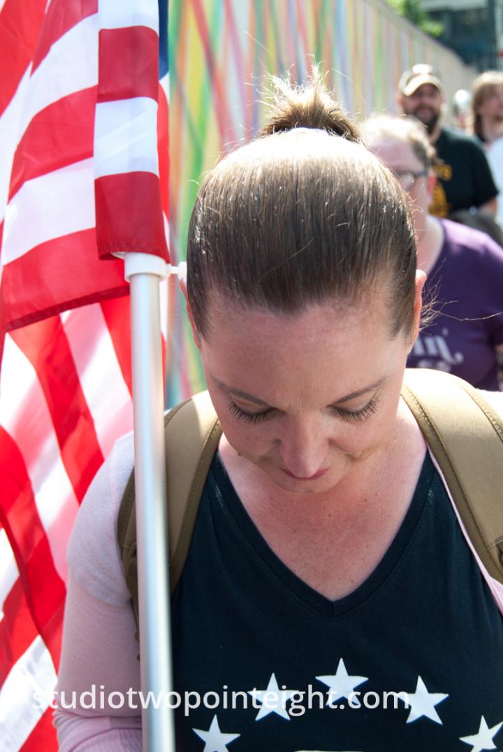 Seattle, Liberty or Death Rally, August 18, 2018, A Woman Marching with a Flag