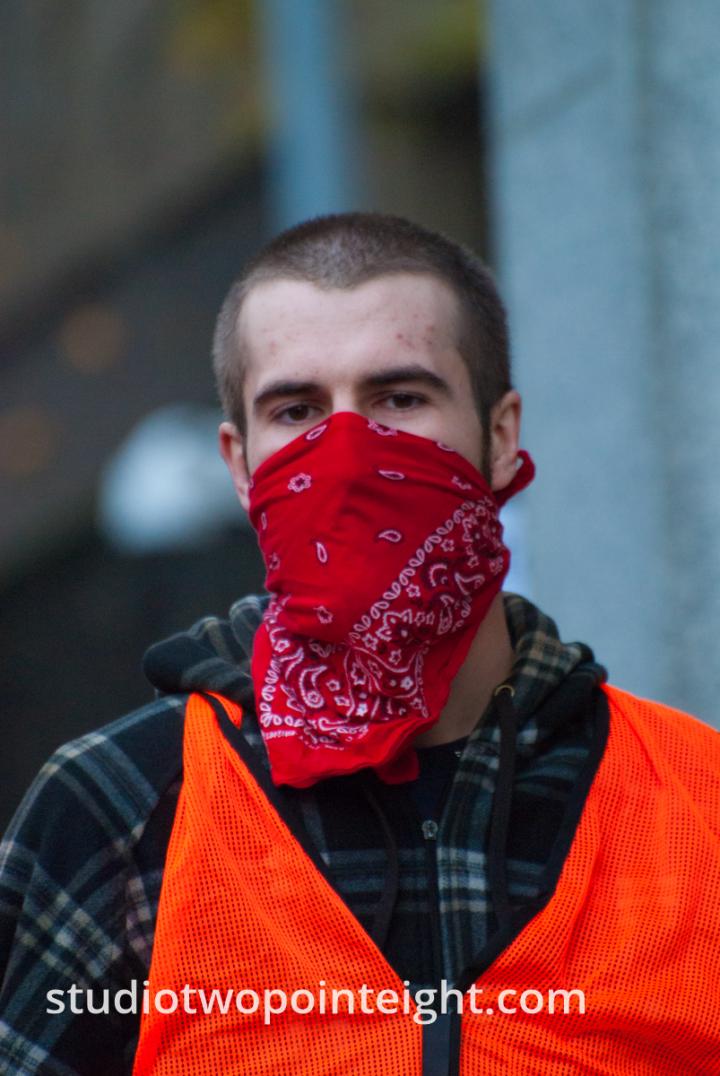 Seattle, Liberty or Death 2 Rally, December 1, 2018, Bandanna Disguised Antifa Counter Protester Was Part Of A Locked Arm Illegal Sidewalk Barricade