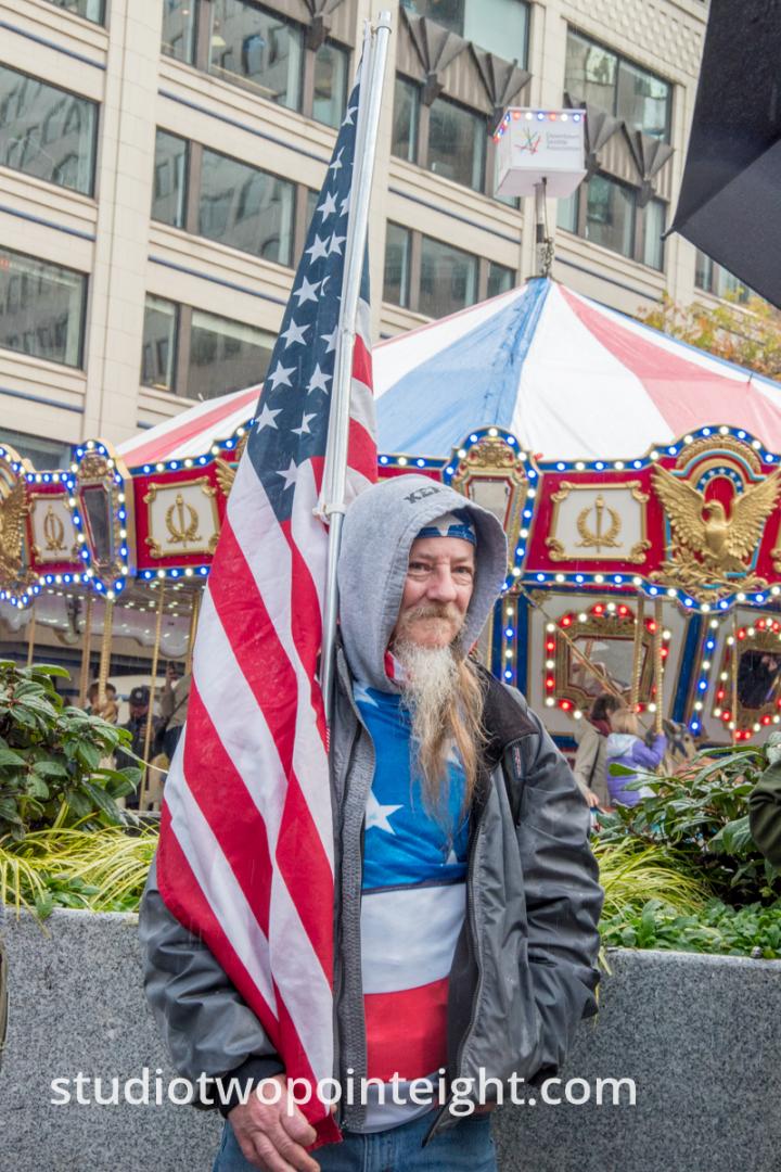 Studio 2.8 at Seattle Pearl Harbor Day Commemoration December 7, 2019, Attendee Carrying An American Flag