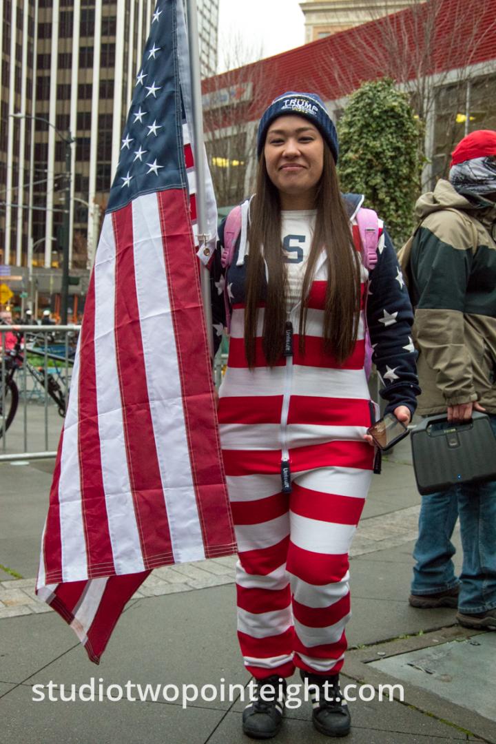 Studio 2.8, December 7, 2019, Pearl Harbor Day, McGraw Square Seattle, A Woman Wearing Festive Red, White, and Blue