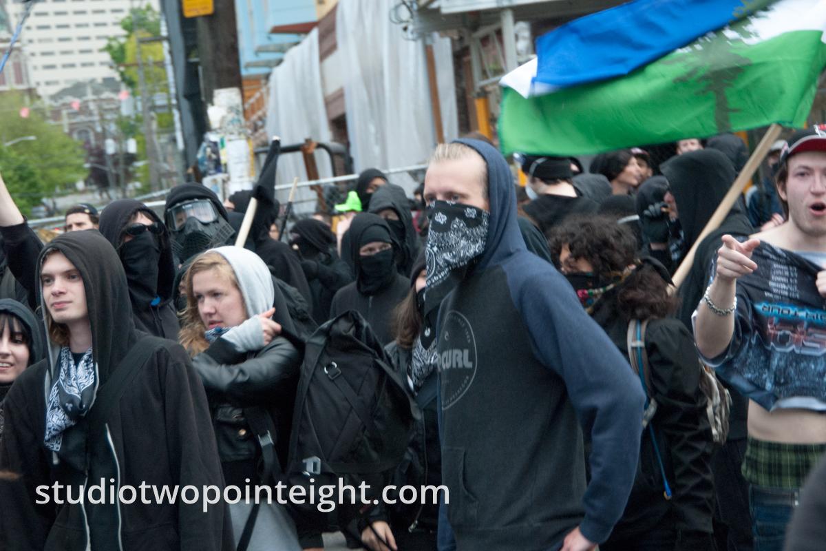 2015 Seattle May Day Protest Mayhem, A Crowd Of Antifa Anarchist Black Bloc Protesters Jeered At Police 