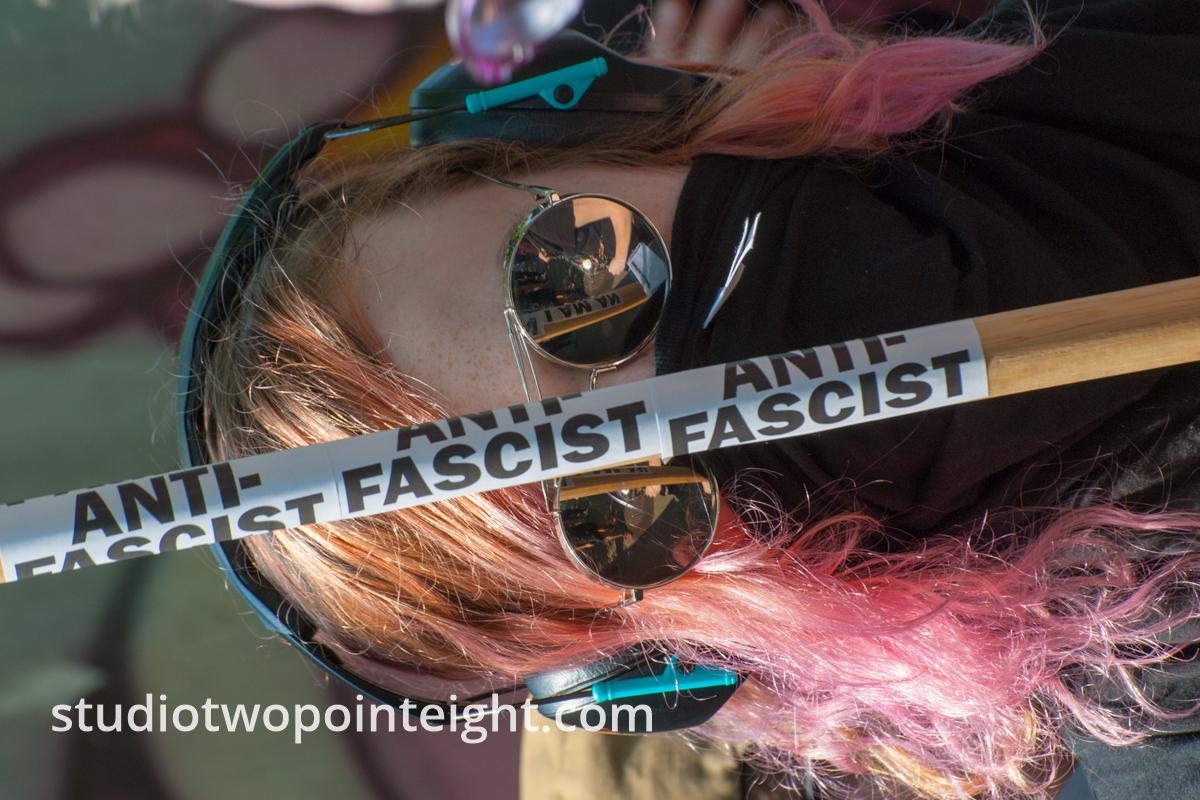 Seattle, Liberty or Death Rally, August 18, 2018, Woman Carrying Antifascist Stick
