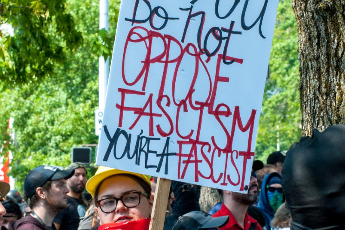 Studio 2.8, Liberty Or Death Rally, August 18, 2018, Female Communist Extremist Held An Oppose Fascism Sign