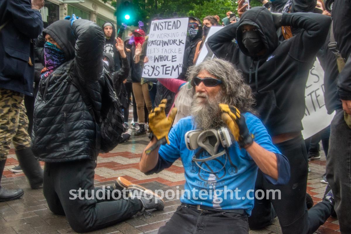 Studio 2.8, Seattle Protests, Black Lives Matter, May 30, 2020, Demonstrators Kneeling Before Police With Their Hands Behind Their Heads