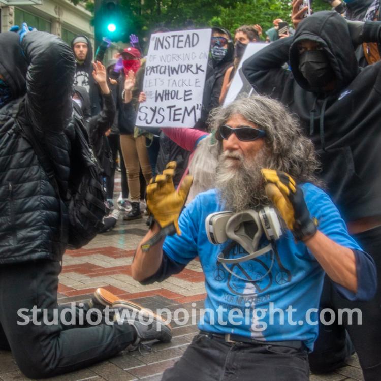 Studio 2.8, Seattle Protests, Black Lives Matter, May 30, 2020, Demonstrators Kneeling Before Police With Their Hands Behind Their Heads