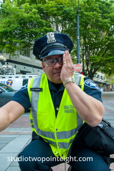 2015 Seattle May Day Protest, Seattle Police Officer Torres Squatted At Westlake Park