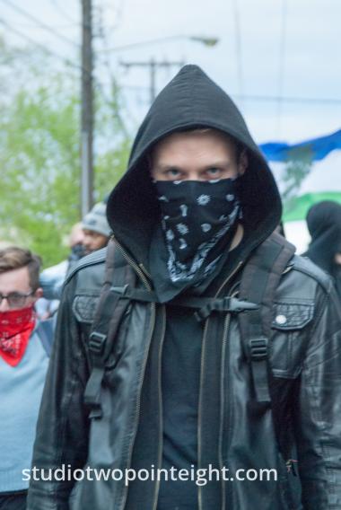 2015 Seattle May Day Protest And Mayhem, A Sinister Looking Anarchist Black Bloc Member Glared 