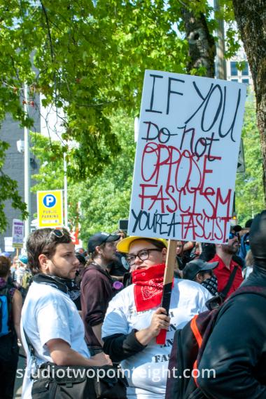Studio 2.8, Liberty Or Death Rally, August 18, 2018, Female Communist Extremist Held An Oppose Fascism Sign