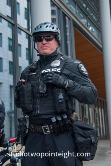 Seattle, Liberty or Death 2 Rally, December 1, 2018, A Seattle Police Officer Posing Like a Comic Book Hero