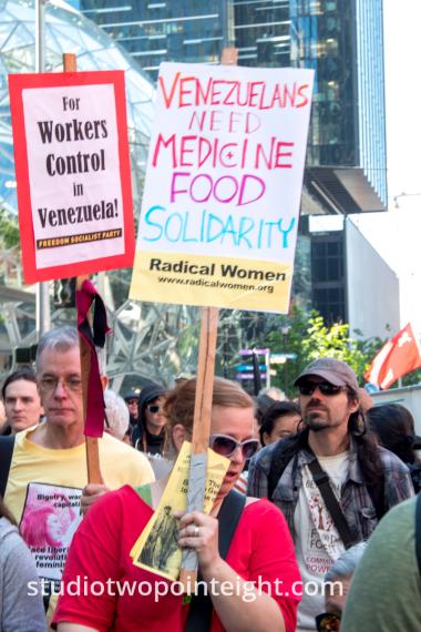 Seattle May 1, 2019 May Day Immigration Rally Woman Carrying Communist Radical Women Sign